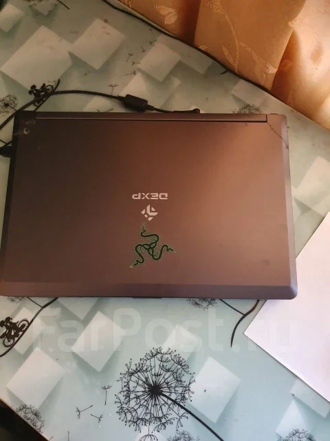 DEXP Ares E102. 15.6", 2,4����, ��� 8 ��, ���� 1 000���, WiFi: 1, Bluetooth: 1 ����