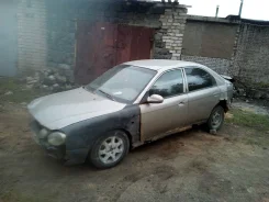 Kia Shuma. KNAFB2422XA903705 ����