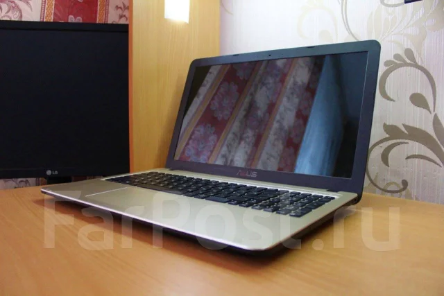 Asus VivoBook X540LJ. 15.6", 1,7����, ��� 8 ��, ���� 500���, WiFi: 1, Bluetooth: 1, ����������� �� 6��. ����