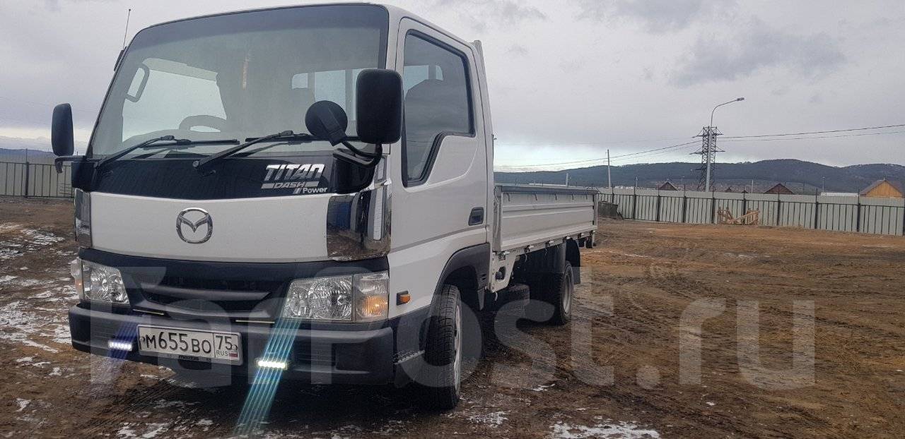 Грузовик мазда дром. Mazda Titan 2001. Мазда Титан 1500 кг sy56tкуптть. Mazda Titan грузоподъемность. Мазда Титан тоннаж.