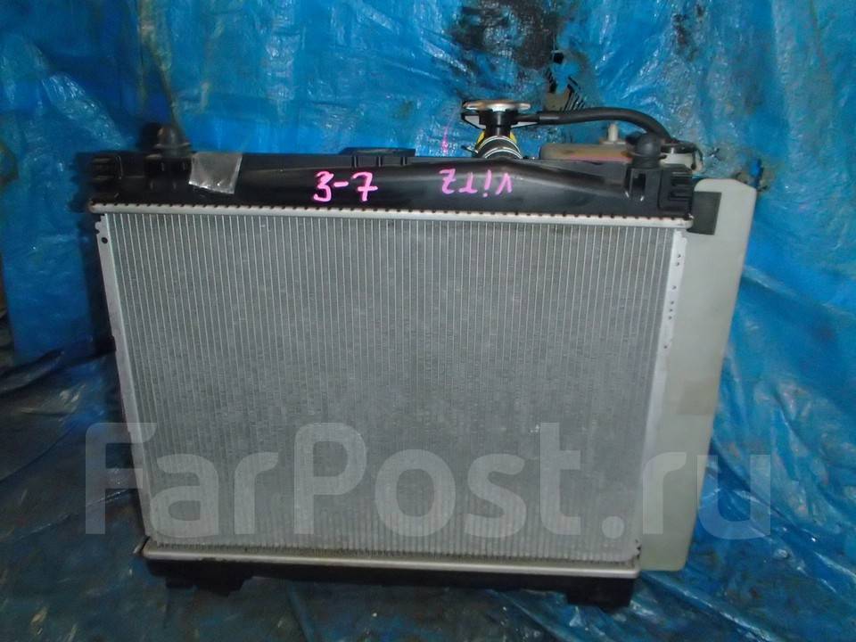 8. Toyota platz вентилятор радиатора охлаждения. радиатор охлаждения витц. Toyota vitz 2001г радиатор. радиатор охлаждения витц.