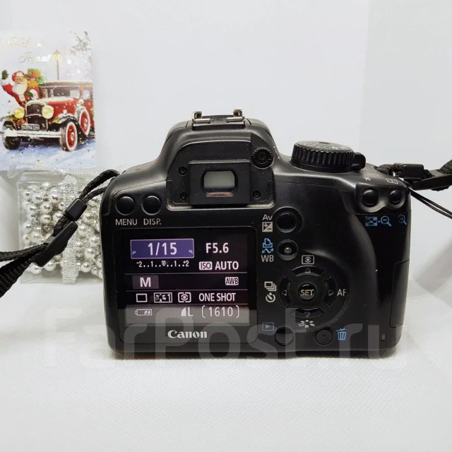 Canon EOS 1000D ����
