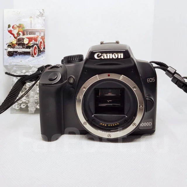 Canon EOS 1000D ����