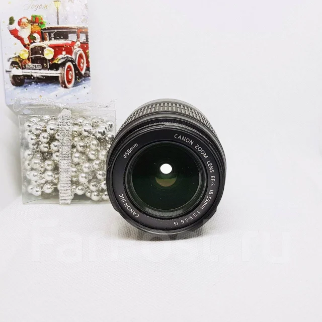 Canon EOS 1000D ����