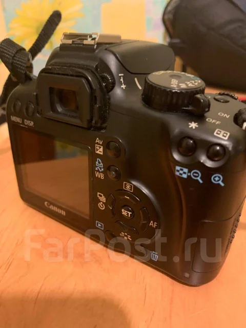 Canon EOS 1000D ����