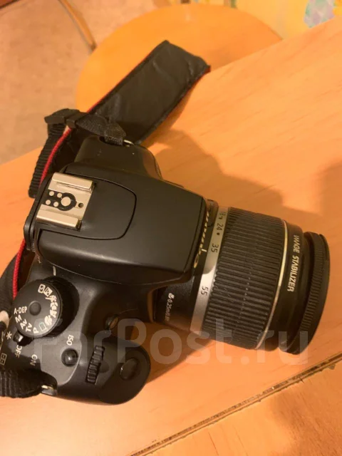 Canon EOS 1000D ����