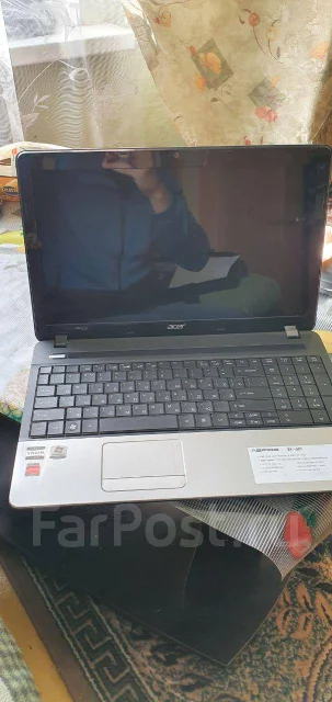 Acer Aspire E1-521. 15.6", 1,7����, ��� 2048 ��, ���� 320���, WiFi: 1 ����