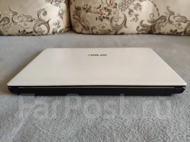 Asus X401A. 14", 1 700����, ��� 8 ��, ���� 240���, WiFi: 1, Bluetooth: 1, ����������� �� 3��. ����