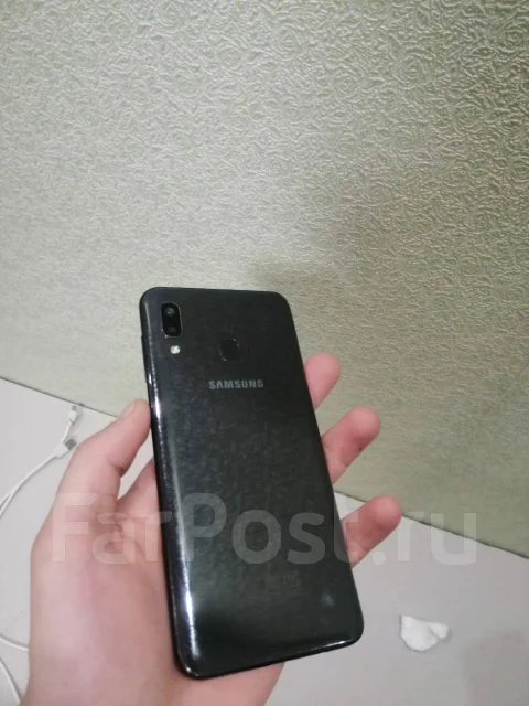 Samsung Galaxy A20. �/�, ������, 3G, 4G LTE, Dual-SIM, NFC ����