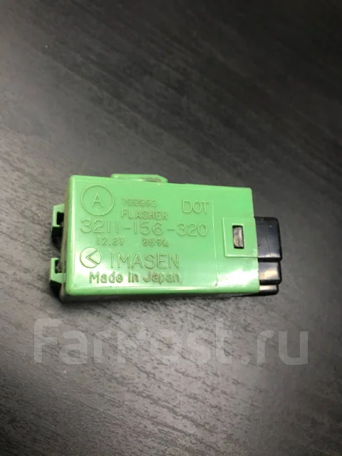 Где находится реле поворотов мазда бонго