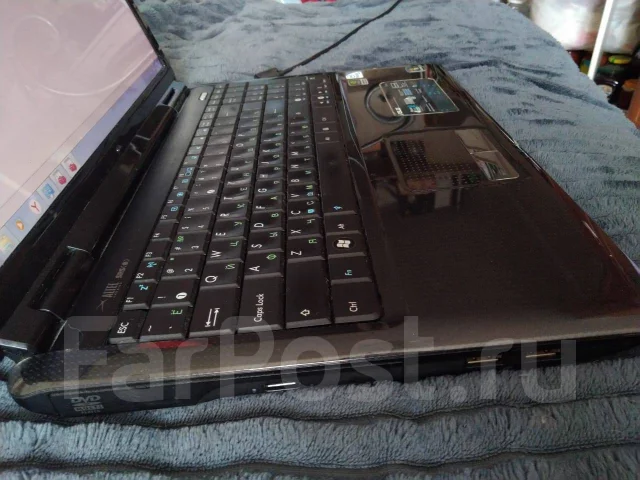 Asus K50IE. 15.6", 2,3����, ��� 4 ��, ���� 300���, WiFi: 1, ����������� �� 1��. ����