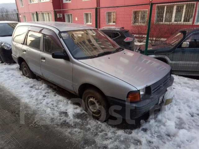 Mazda Familia. ��������, 4wd, 1.5 (104��.�.), ������ ����