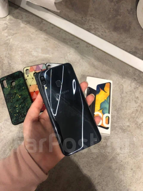 Samsung Galaxy A30. �/�, �����, 3G, 4G LTE, Dual-SIM, NFC ����