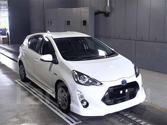 Тойота аква владивосток без пробега. Toyota Aqua 2016. Тойота Аква 2016 год. Тойота Аква 2019 белая. Toyota Aqua обвес.