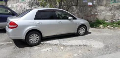 Nissan Tiida Latio. �������, 4wd, 1.5 (109��.�.), ������, 127����. �� ����