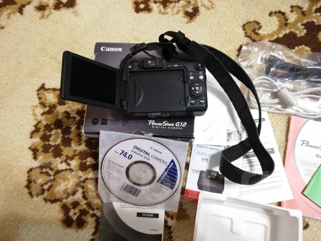 Canon PowerShot G12. 10 - 14.9 ��, ���: 5� ����