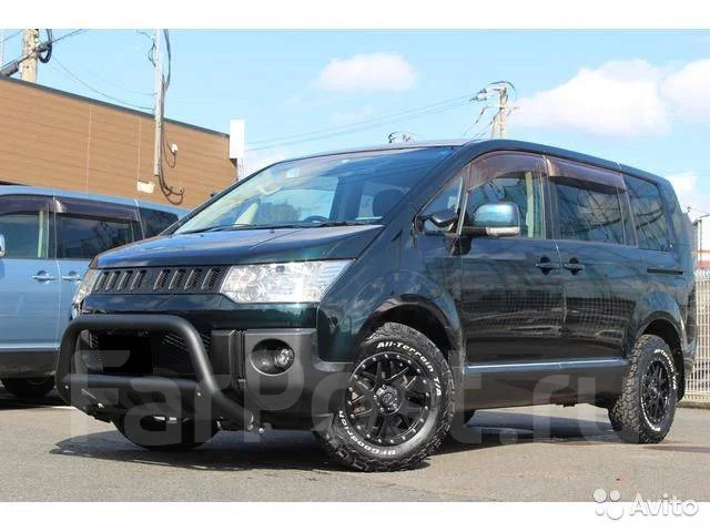 Митсубиси микроавтобус 2011. Mitsubishi delica 2011-2024. Mitsubishi delica d2. Delica белая решетка. Делика д5 2011.