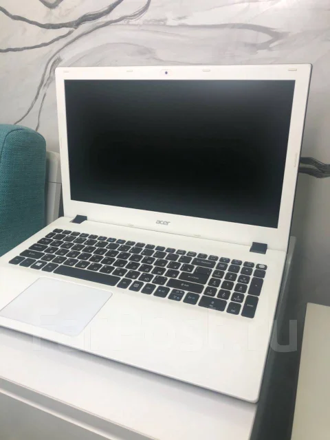 Acer Aspire E5-573-331J. 15.6", 1 700����, ��� 4 ��, ���� 500���, WiFi: 1, Bluetooth: 1, ����������� �� 4��. ����