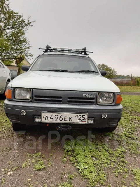Mazda Familia. ��������, 4wd, 1.5 (105��.�.), ������, 250 000����. �� ����