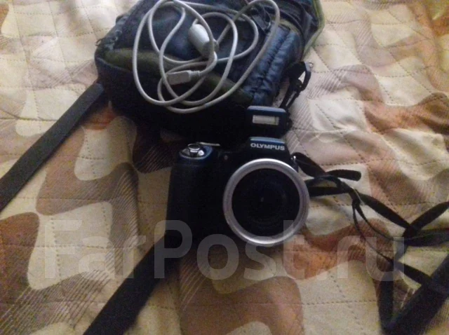 Olympus FE-370. 10 - 14.9 ��, ���: 14� � ����� ����
