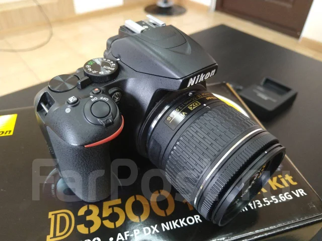 Nikon D3500. 20 � ����� ��, ���: 14� � ����� ����