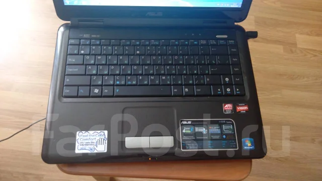Asus K40AB. 14", 2,1����, ��� 2048 ��, ���� 80���, WiFi: 1 ����