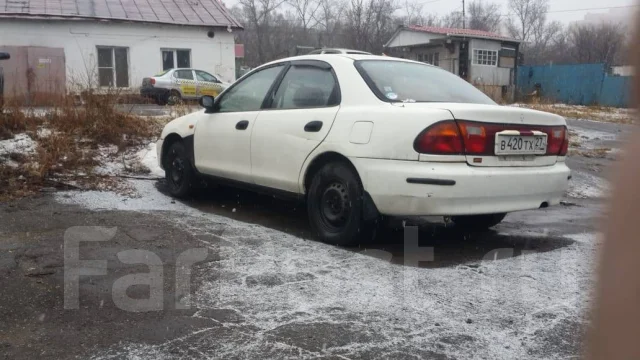 Mazda Familia. ��������, 4wd, 1.5 (80��.�.), ������ ����