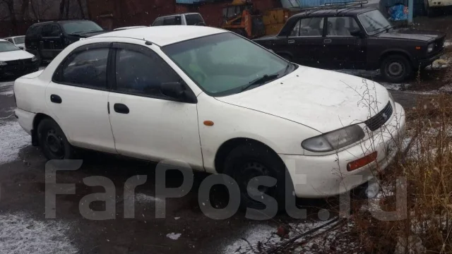 Mazda Familia. ��������, 4wd, 1.5 (80��.�.), ������ ����