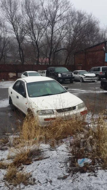 Mazda Familia. ��������, 4wd, 1.5 (80��.�.), ������ ����
