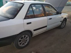 Mazda 323. JMZBG129200533902 ����