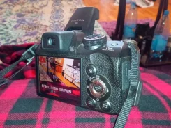 Fujifilm FinePix S4000. 10 - 14.9 ��, ���: 14� � ����� ����