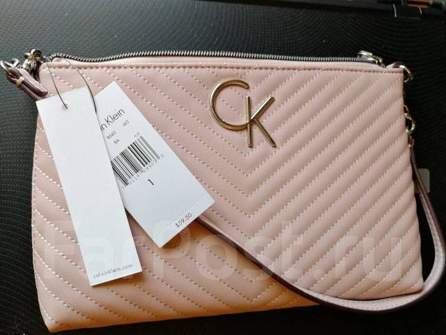 Calvin klein deals clutch