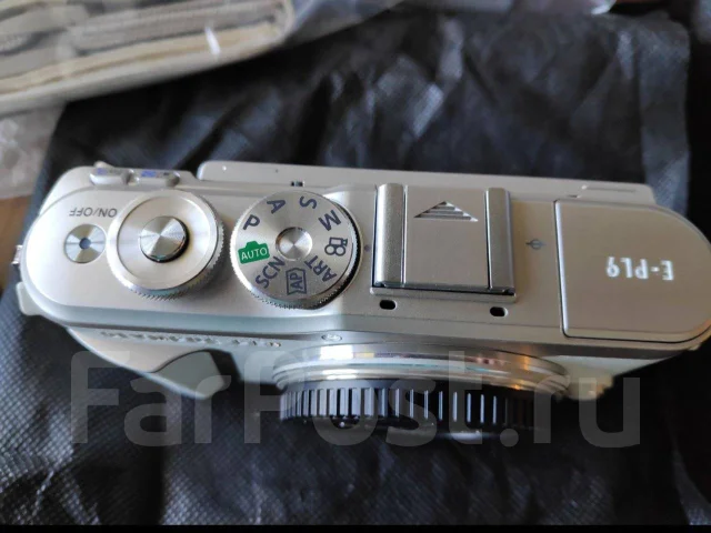 Olympus Pen E-PL9. 15 - 19.9 �� ����