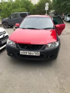 Mazda Familia. �������, ��������, 2.0 (170��.�.), ������ ����