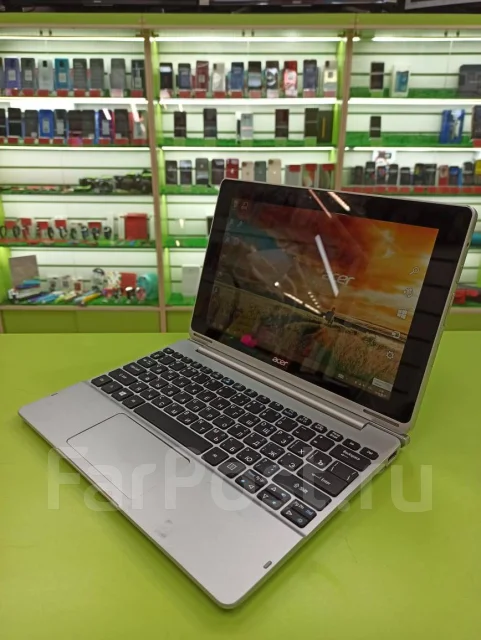 Acer Aspire Switch 10. 10.1", 1 330����, ��� 2048 ��, ���� 64���, WiFi: 1, Bluetooth: 1, ����������� �� 3��. ����