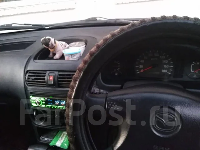 Mazda Familia. �������, ��������, 1.3 (100��.�.), ������, 150 000����. �� ����
