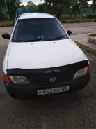 Mazda Familia. �������, ��������, 1.3 (100��.�.), ������, 150 000����. �� ����