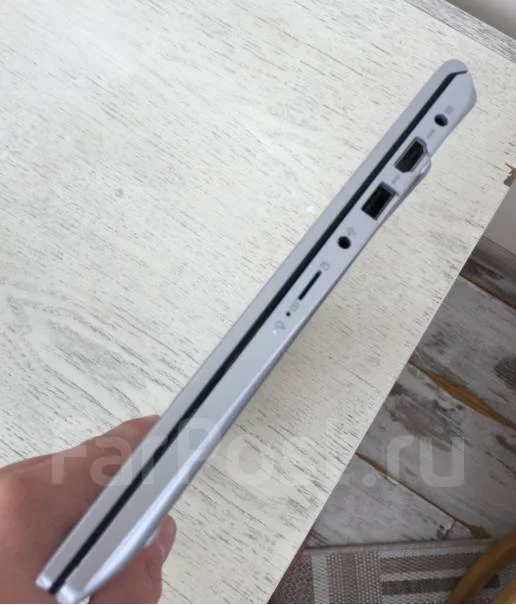 Asus VivoBook 14. 14", 2,3����, ��� 4 ��, ���� 128���, WiFi: 1, Bluetooth: 1, ����������� �� 8��. ����