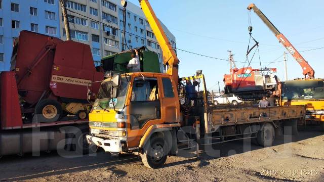 Погрузка машин на автовоз