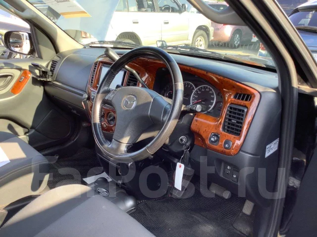 Mazda Tribute. EPFW, AJ ����