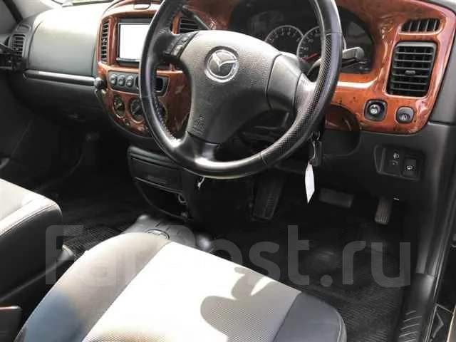 Mazda Tribute. EPFW, AJ ����
