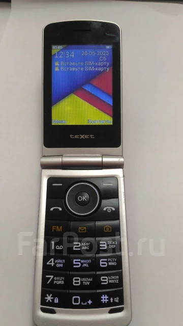 teXet TM-404. �/� ����