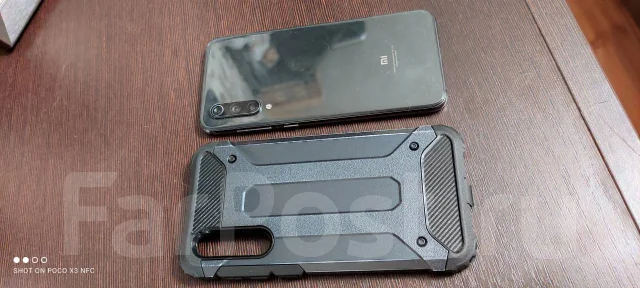 Xiaomi Mi9 SE. �/�, ������, NFC ����