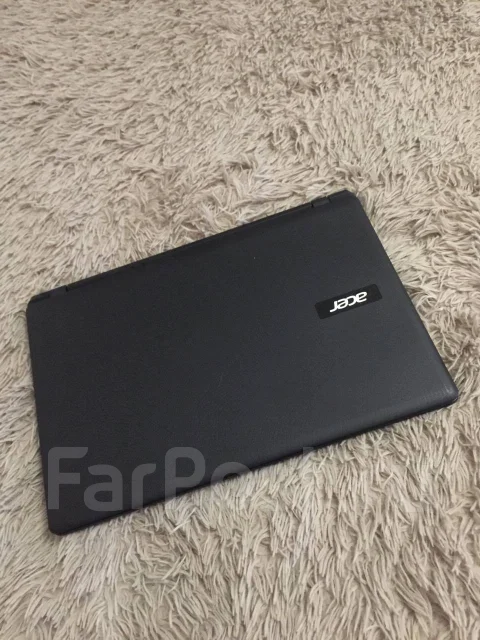 Acer Aspire ES1. 15.6", 1,5����, ��� 2048 ��, ���� 500���, WiFi: 1, Bluetooth: 1, ����������� �� 6��. ����
