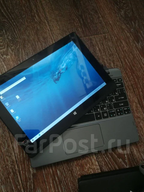 Acer Aspire Switch 10. 10.1", 1,8����, ��� 2048 ��, ���� 32���, WiFi: 1, Bluetooth: 1, ����������� �� 3��. ����