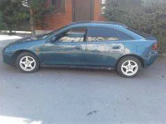 Mazda 323F ����
