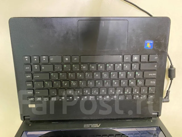 Asus X401A. 14", 2,1����, ��� 2048 ��, ���� 320���, WiFi: 1, Bluetooth: 1, ����������� �� 1��. ����