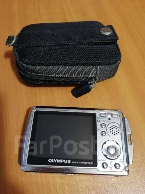 Olympus Stylus 720SW. 7 - 7.9 ��, ���: 3� ����