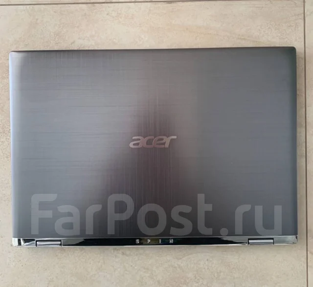 Acer Spin 1. 11.6", 2,4����, ��� 4 ��, ���� 64���, WiFi: 1, Bluetooth: 1, ����������� �� 12��. ����