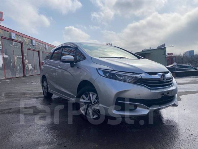 Хонда шаттл 2015 гибрид. Фото хонда шаттл новокузнецк. Хонда шаттл без пробега владивосток. Honda shuttle hybrid правый руль (2015-н. Honda shuttle gp7 гибрид салон.